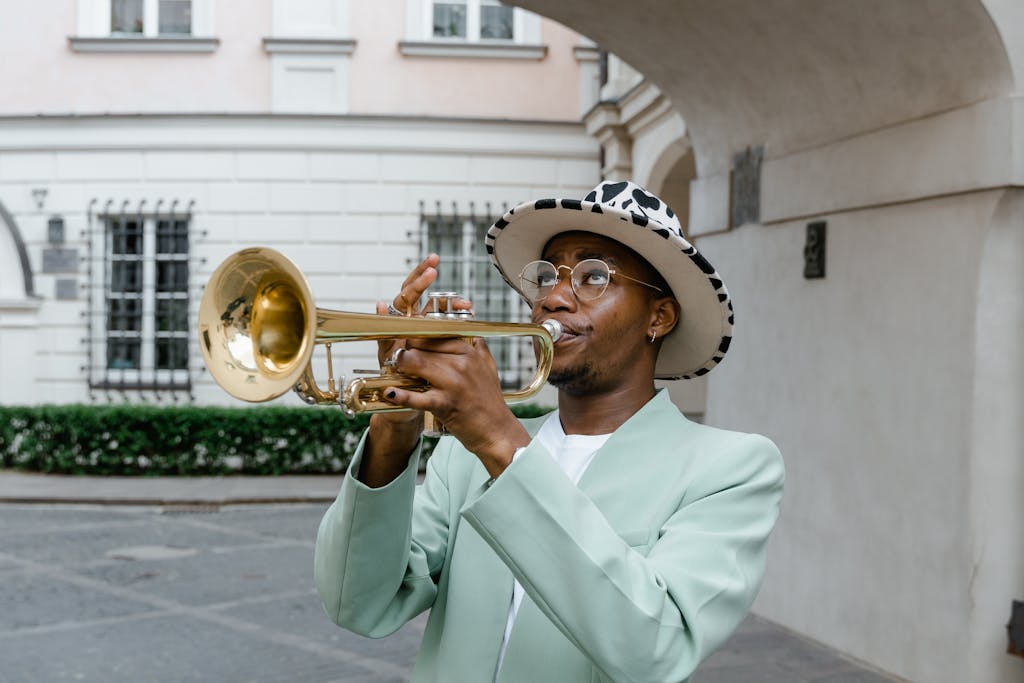 Man in Suit Playing Trumpet. Polyrhythm article.