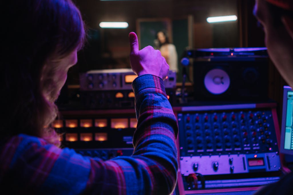 A Man Using an Audio Equipment